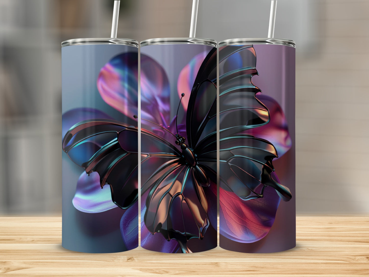 Three tumblers with metallic butterfly designs on abstract floral backgrounds.