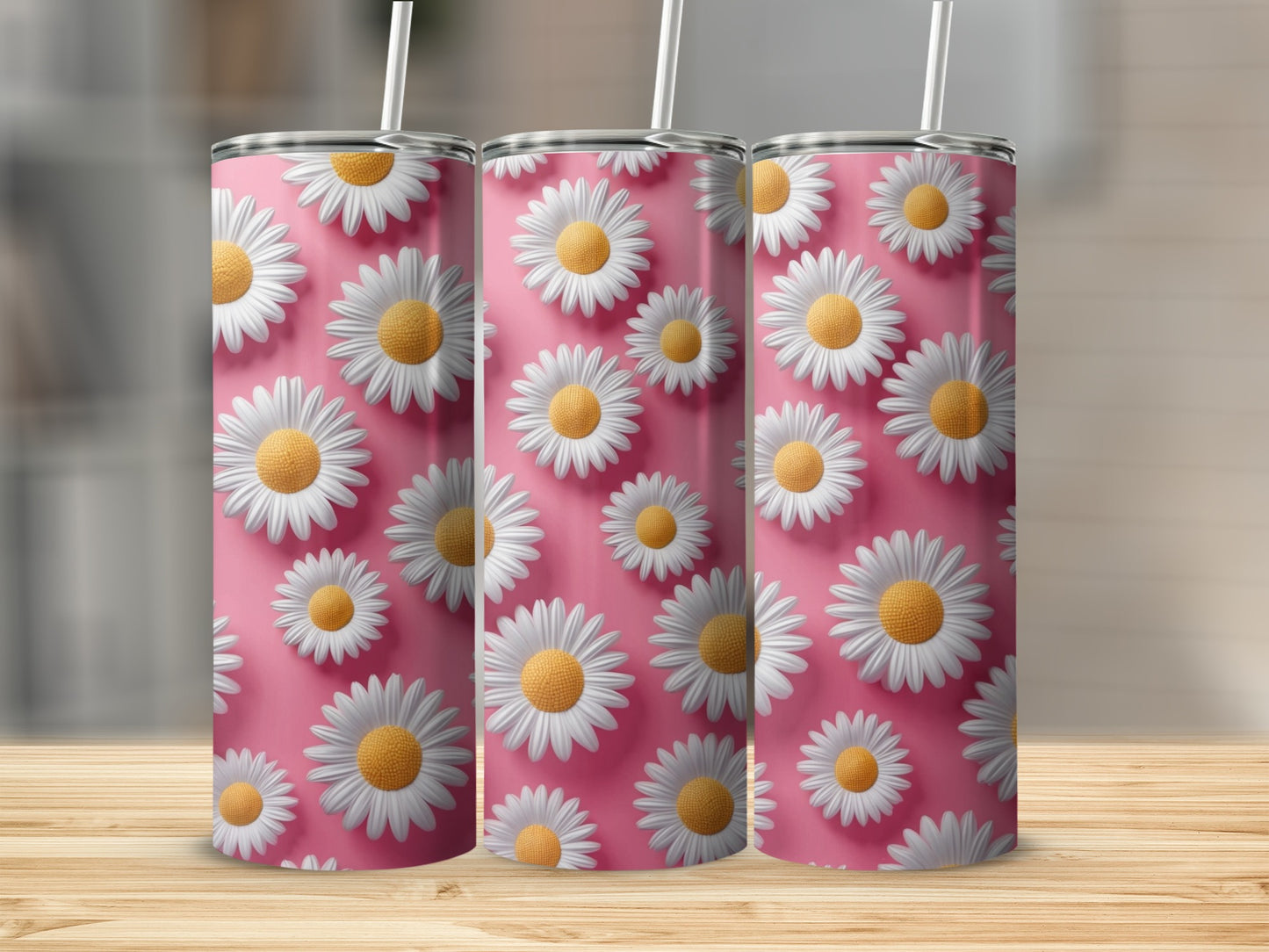 Three tumblers with white daisies on a pink background.