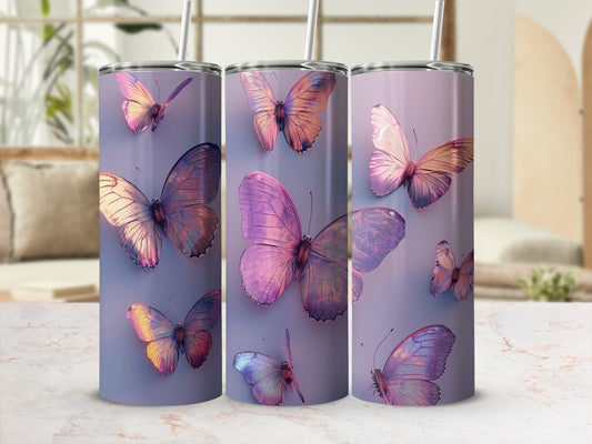 Tumbler with iridescent butterflies on a pale purple background.