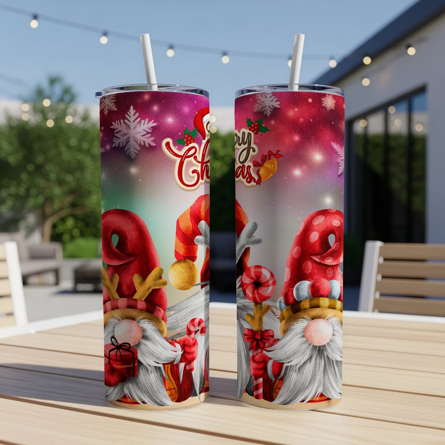 Christmas gnomes with candy canes on a decorated tumbler.