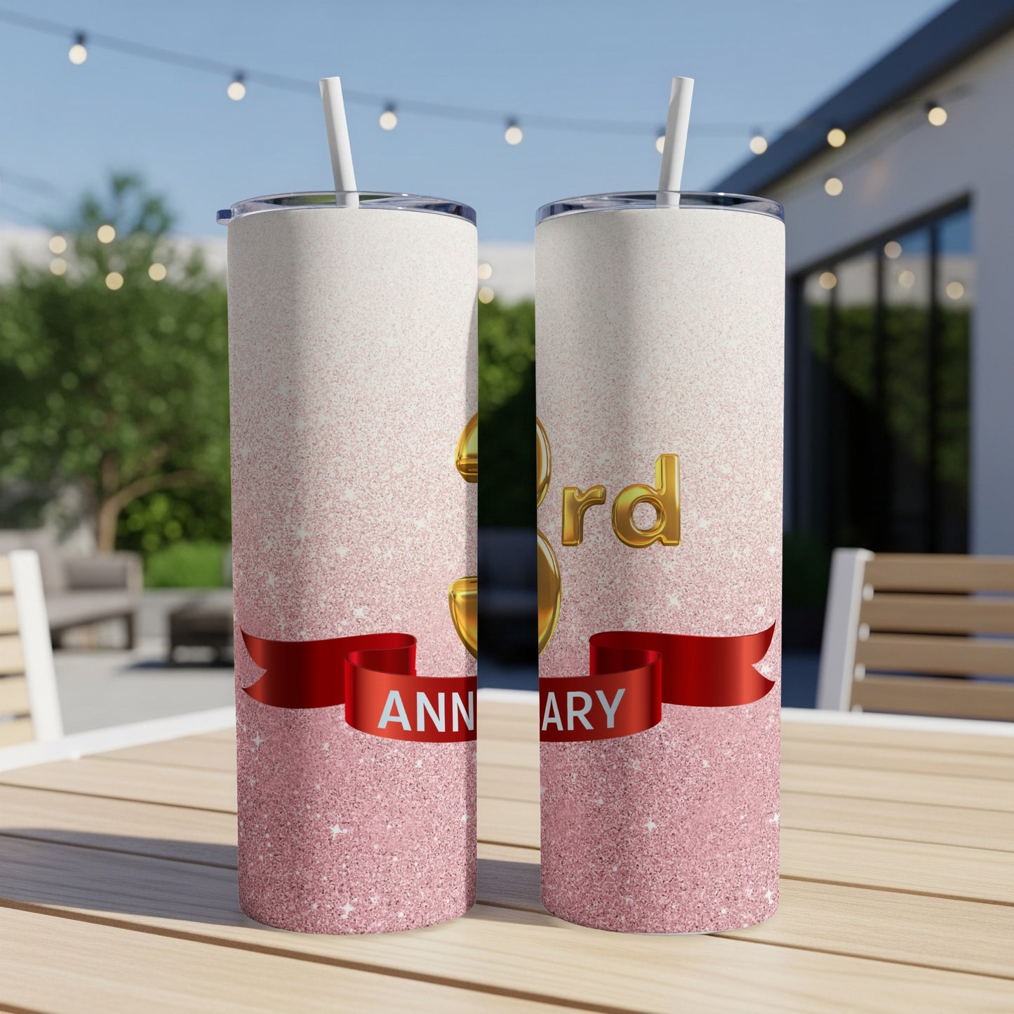 Two tall glitter tumblers with "30th Anniversary" text on a ribbon.