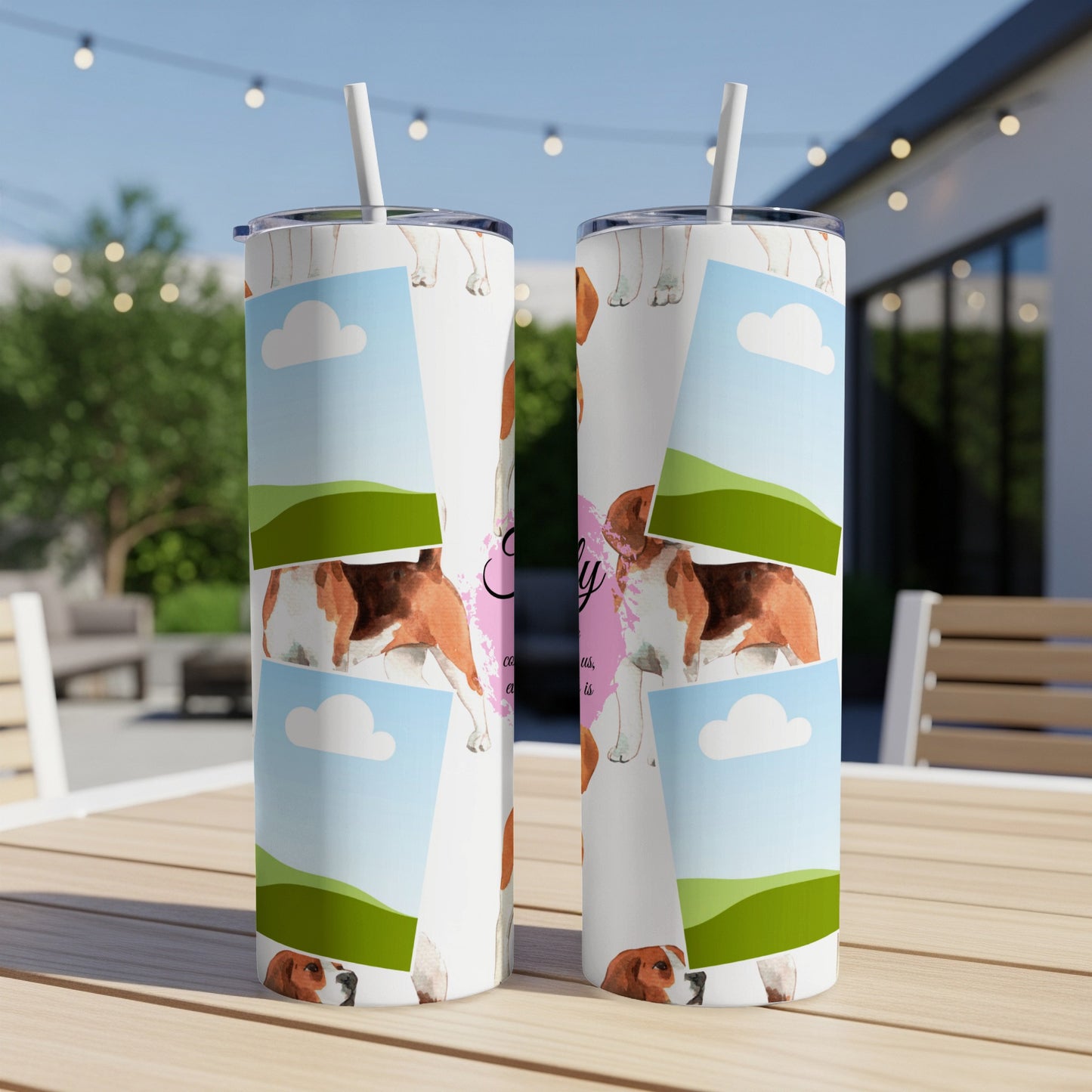 Tumbler with a watercolor dog print and the word "Family"
