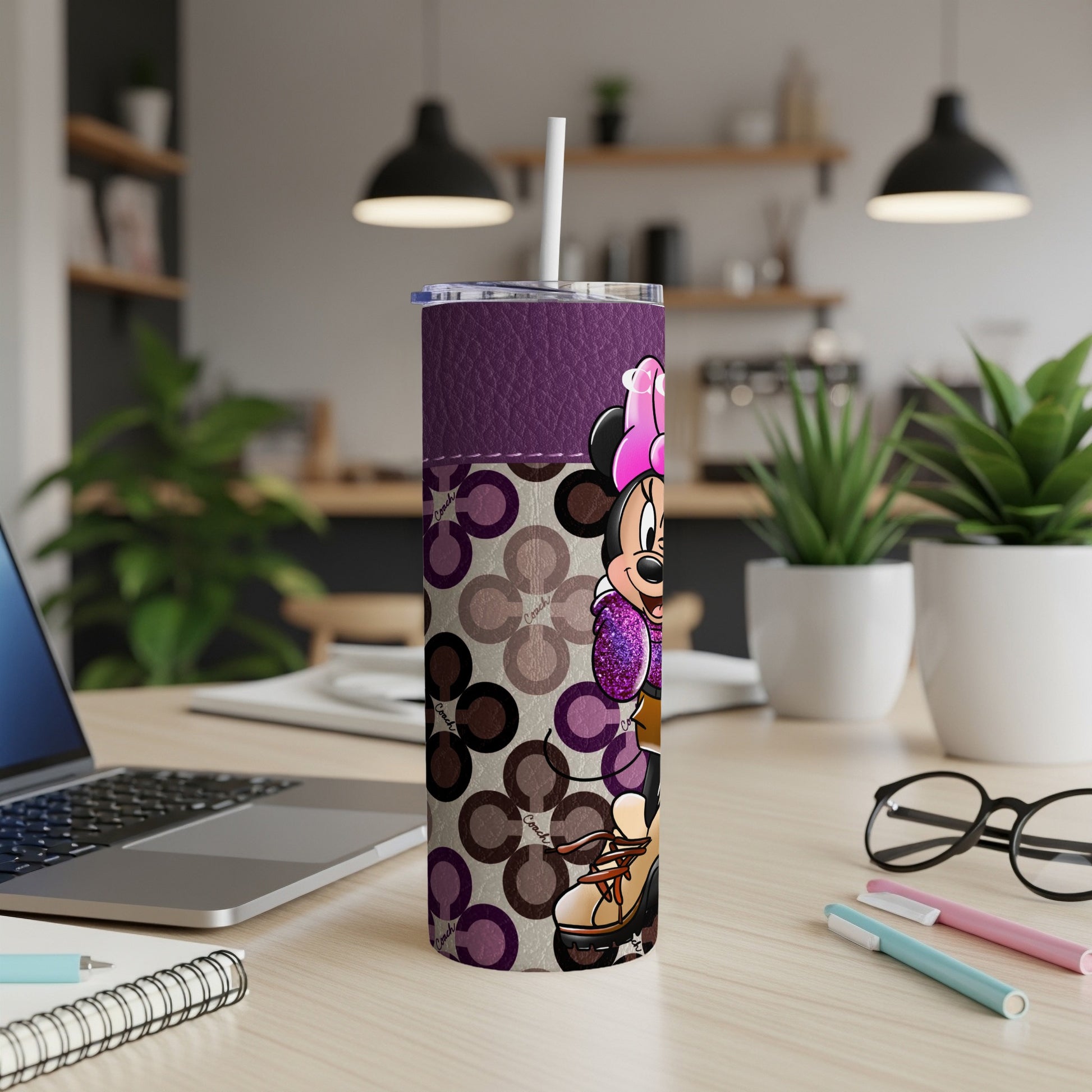 Minnie Mouse tumbler with purple leather and retro circle pattern.