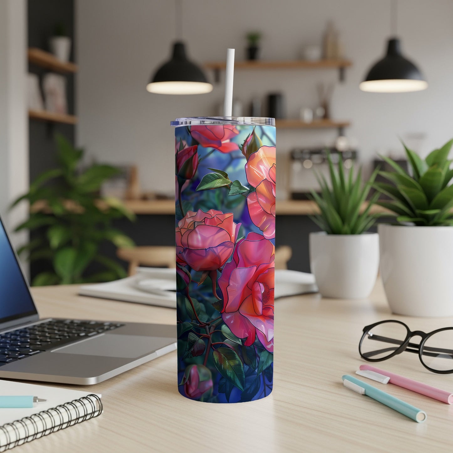 Tall tumbler with vibrant pink roses against a dark background.