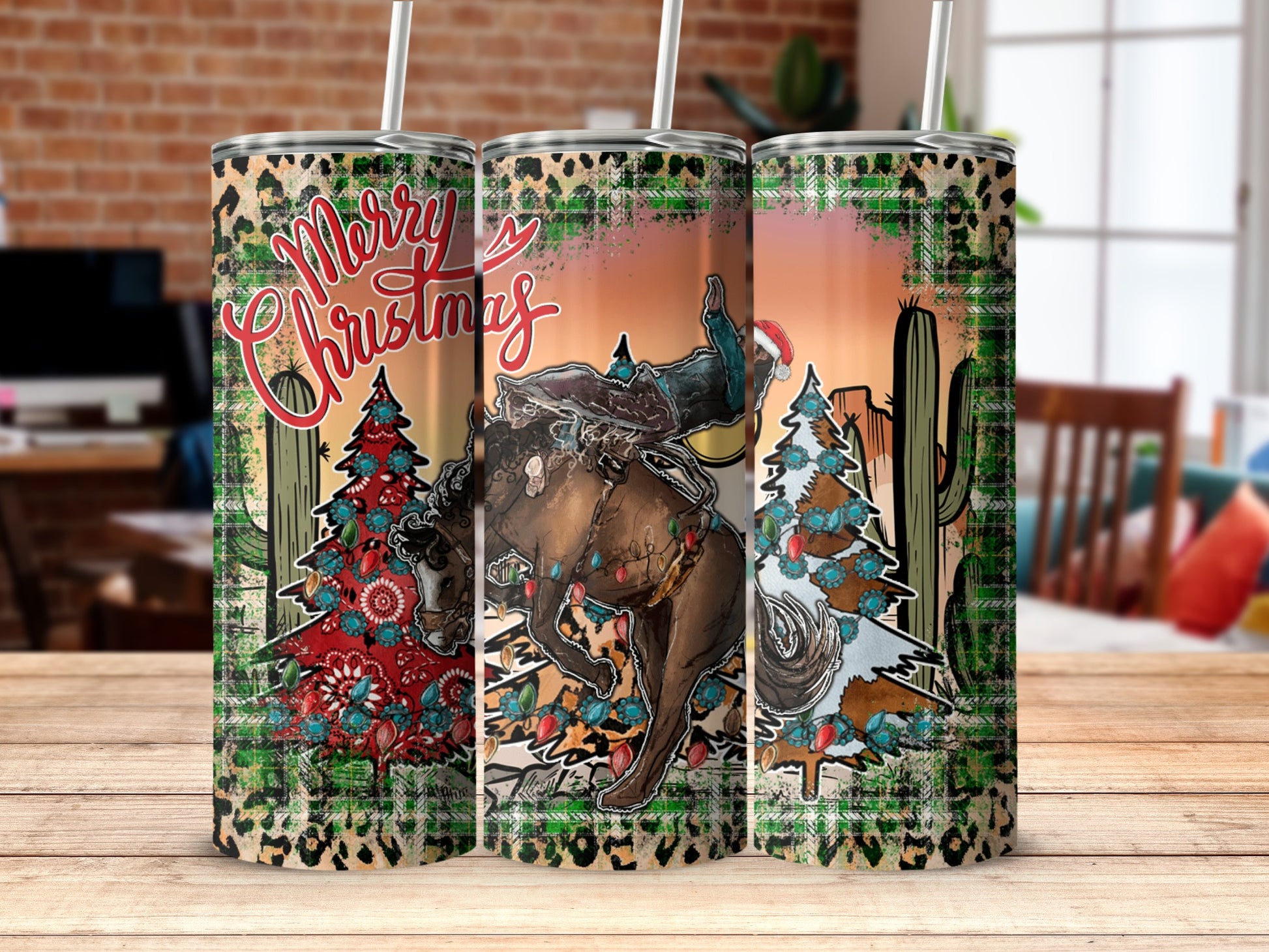 Three tumblers with a cowboy on a bucking horse and festive Christmas trees.