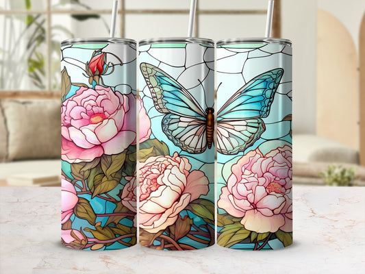 Three tumblers with stained-glass butterfly and rose designs.