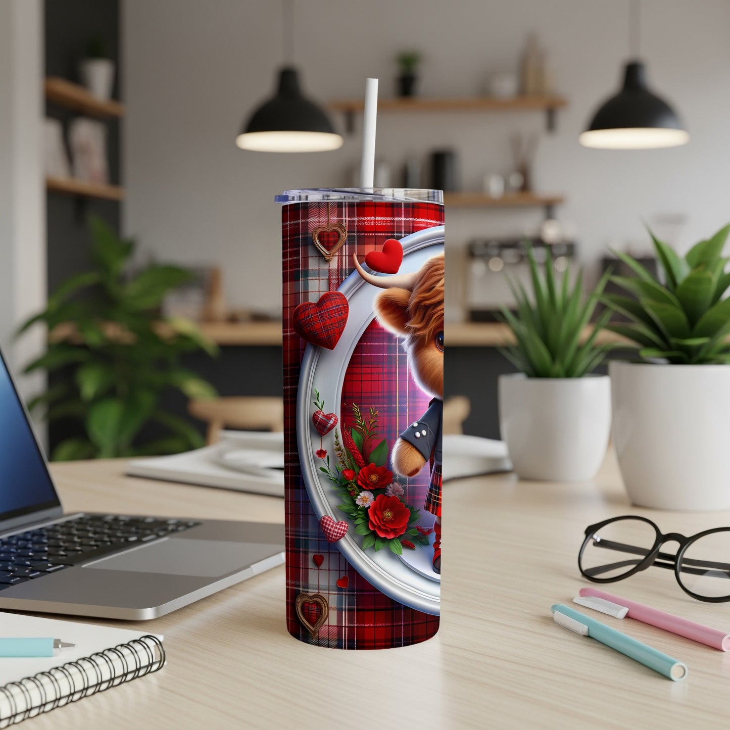 Cow with hearts and flowers on a plaid tumbler.