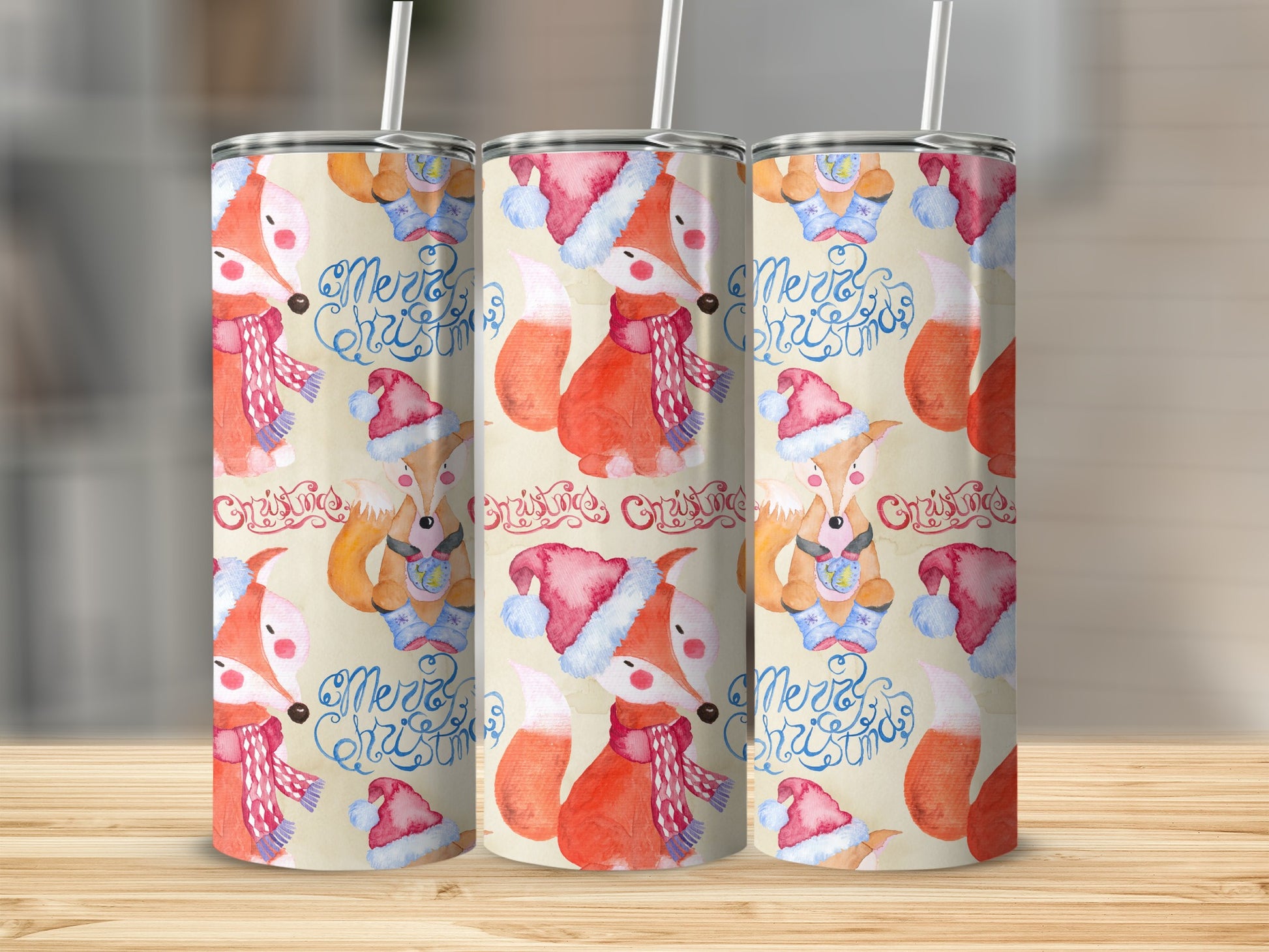 Three tumblers with a Christmas fox pattern and "Merry Christmas" text.