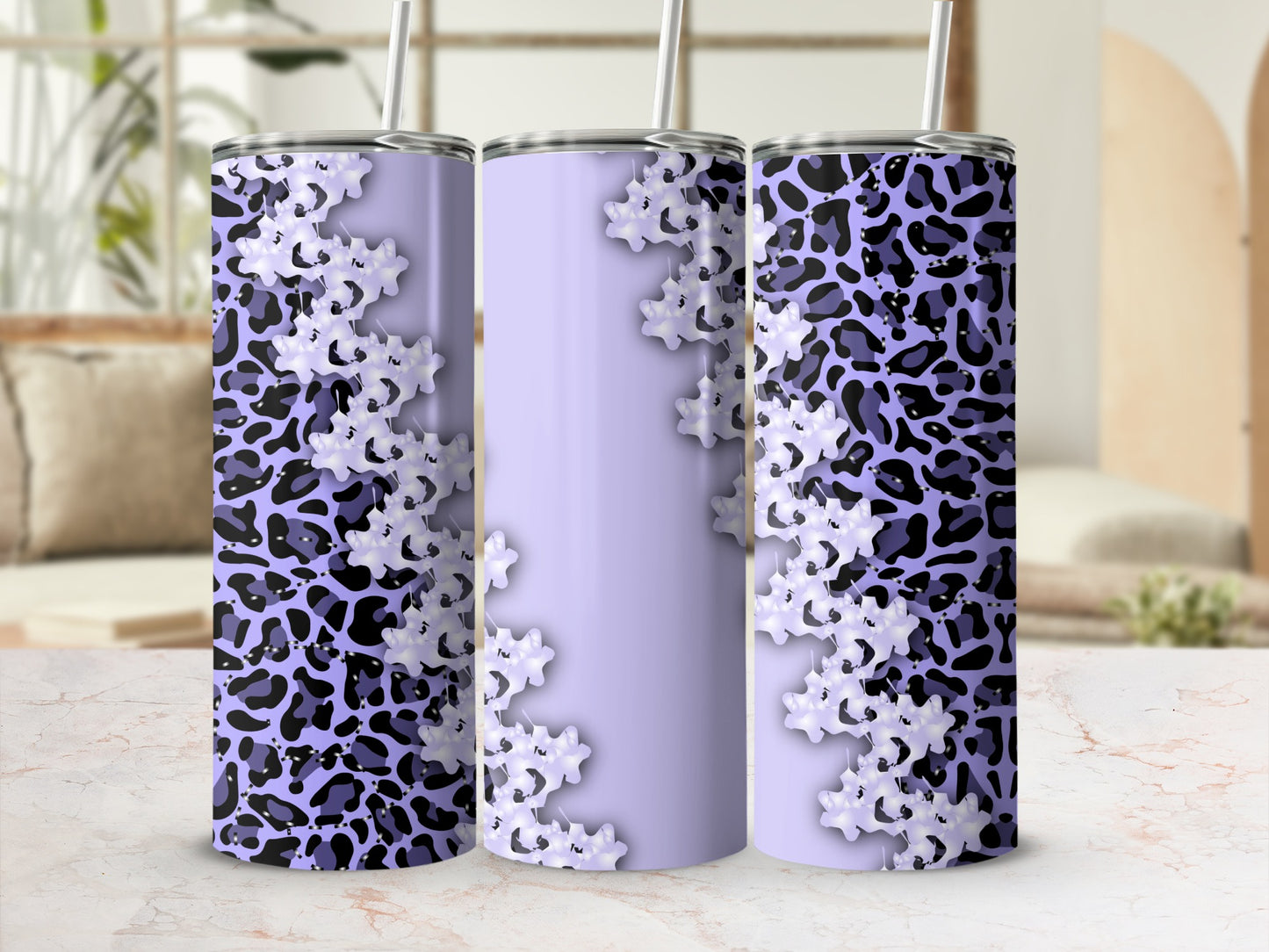 Purple and white leopard print tumbler with floral accents.