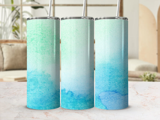 Three tumblers with a watercolor gradient from green to blue.