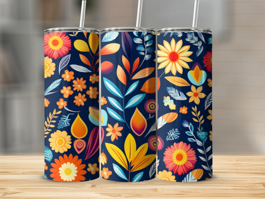 Three navy blue tumblers with a repeating floral pattern of colorful flowers and leaves.