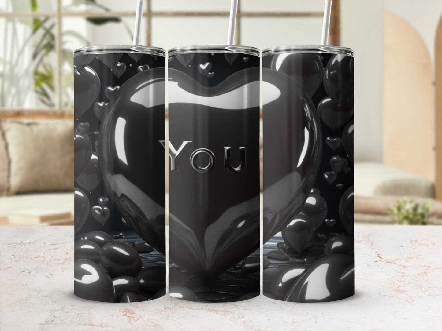 Black heart-shaped tumbler with "YOU" text and floating hearts.