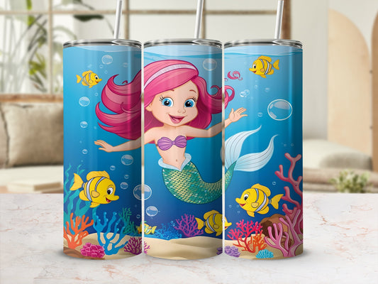 Cartoon mermaid with pink hair swims with yellow fish in coral reef.