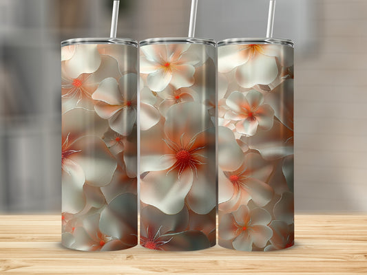 Three tumblers with a floral design featuring white and coral flowers.