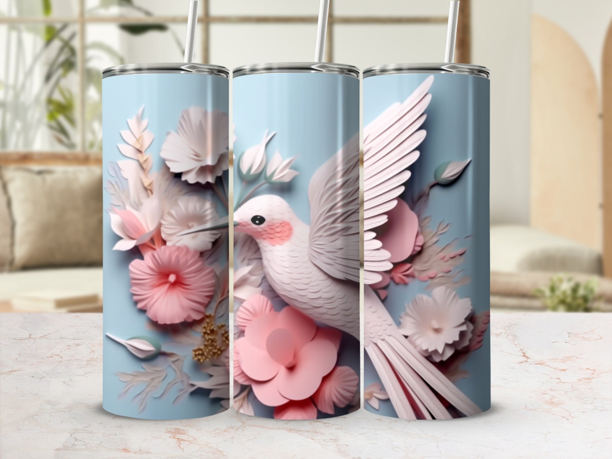 Light blue tumbler with white bird and pink floral design.