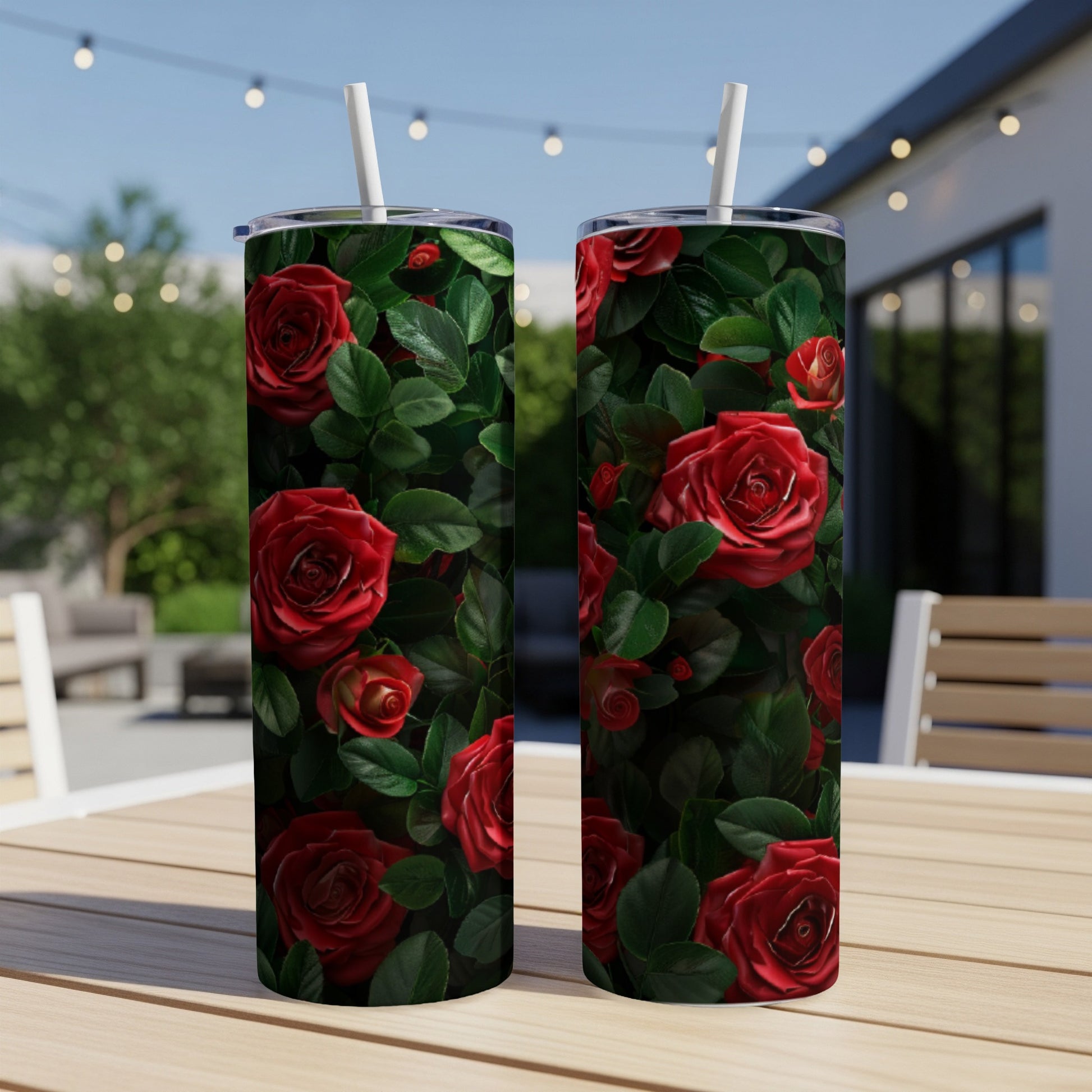 Two tall tumblers with a vibrant red rose floral pattern.