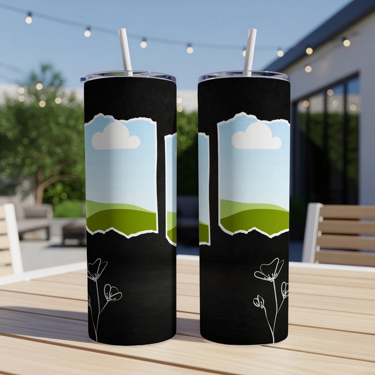 Two black tumblers with ripped paper effect showing sky, clouds, and green hills.