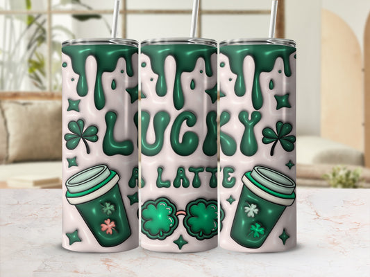 Green lucky latte design on three tumblers with shamrocks and drips.