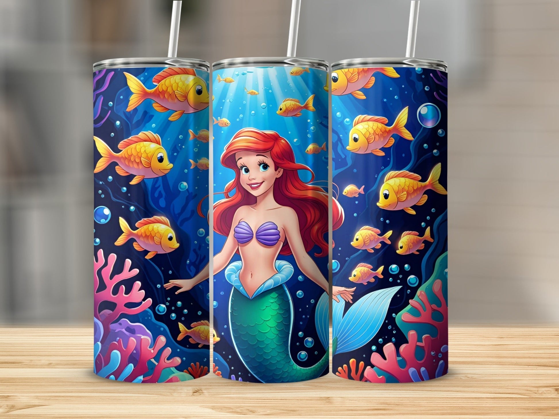 Ariel the mermaid with fish and coral on a blue underwater background.