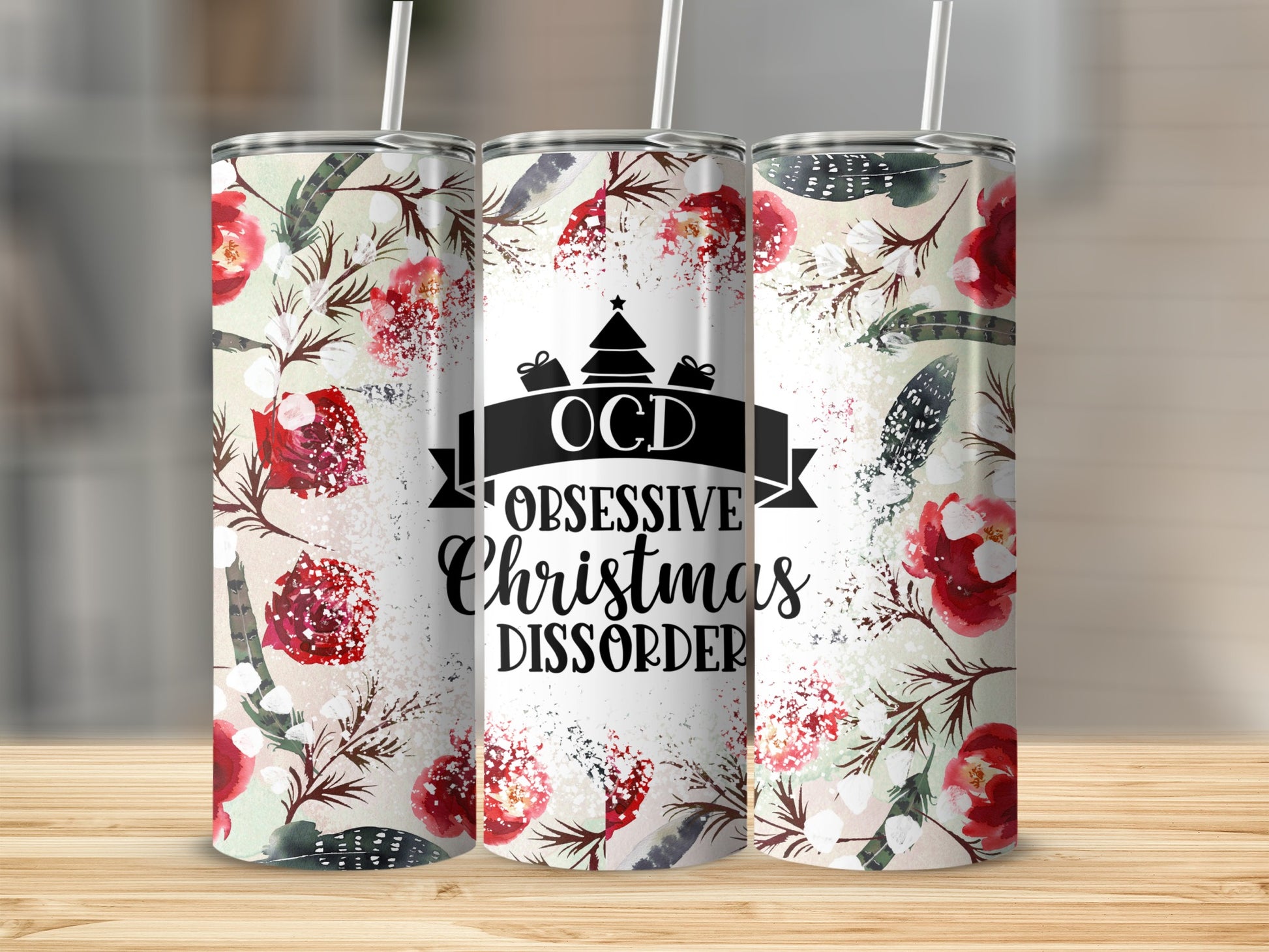Tumbler with Christmas floral design and text "OCD Obsessive Christmas Disorder".