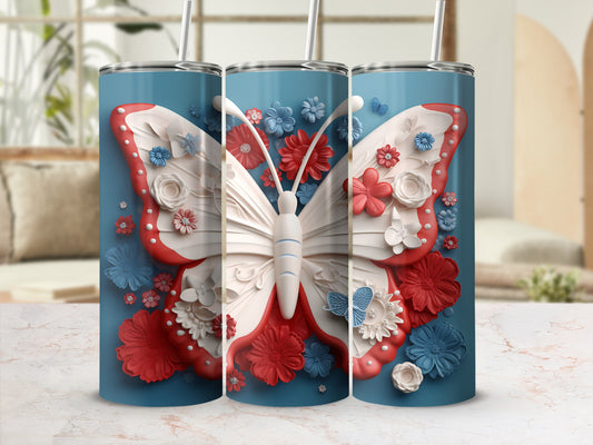 Blue tumbler with a large white butterfly and floral designs.
