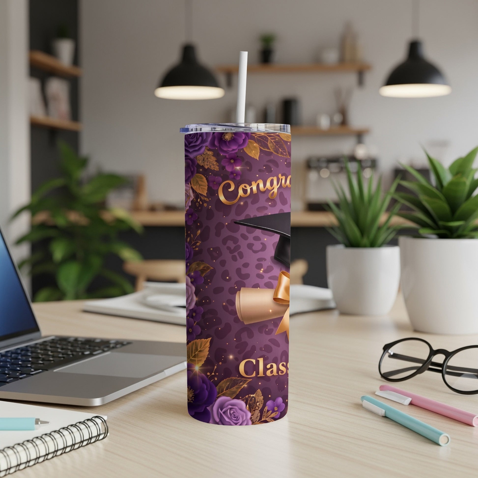 Graduation tumbler with floral pattern and "Class of" text.