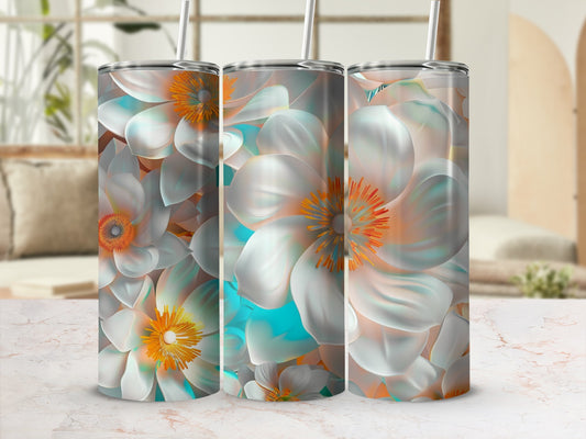 Three tumblers with a bright white and orange floral pattern and teal accents.