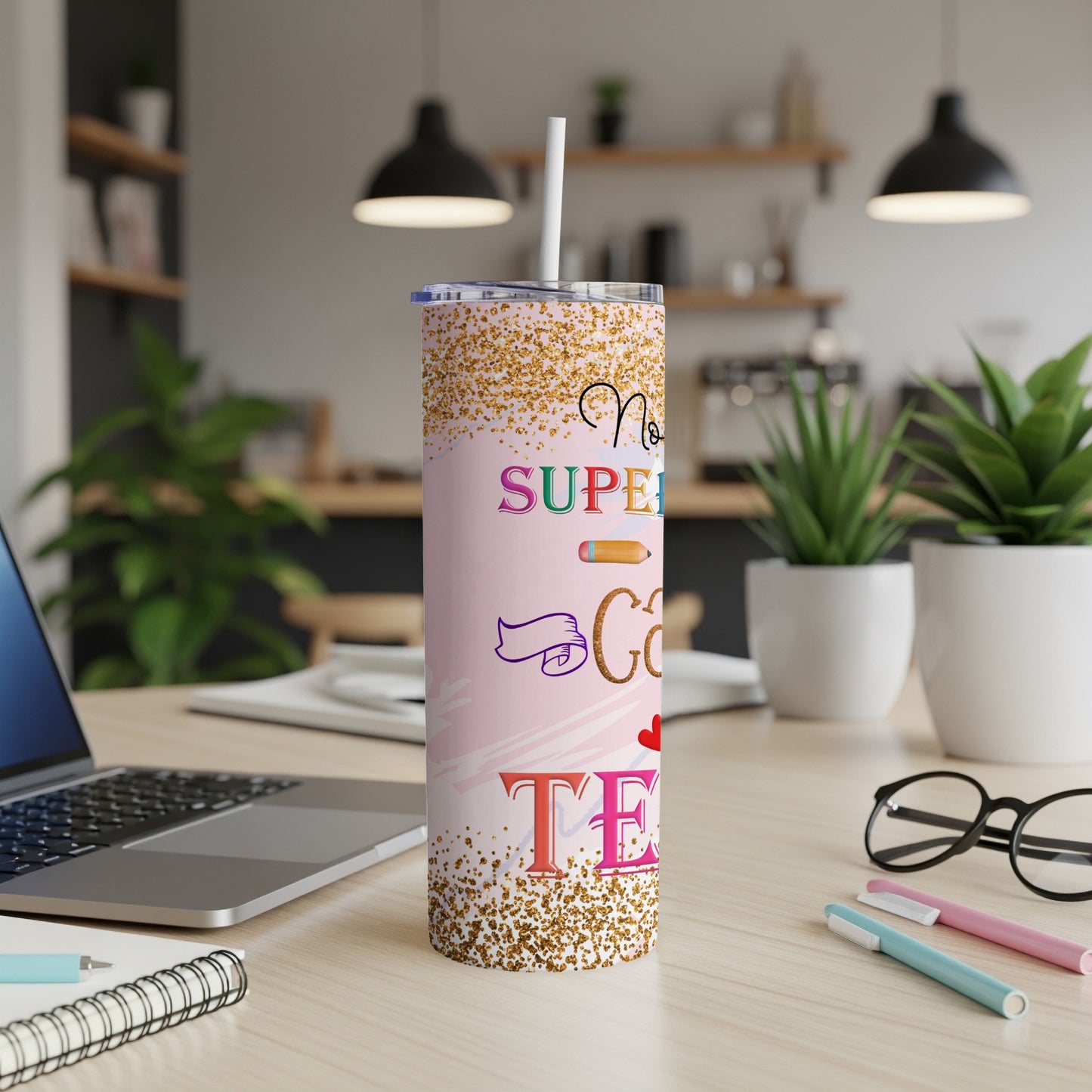 Pink tumbler with gold glitter and "Not All Superheroes Wear Capes. Some Teach." text.