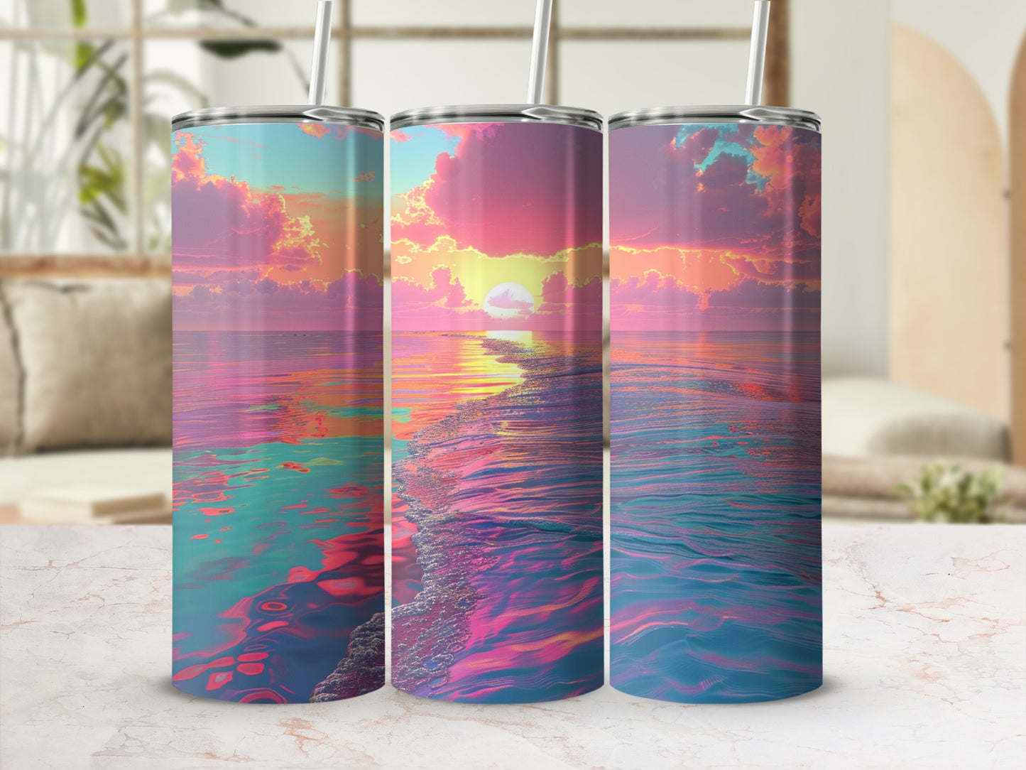Three tumblers with a sunset ocean reflection design.