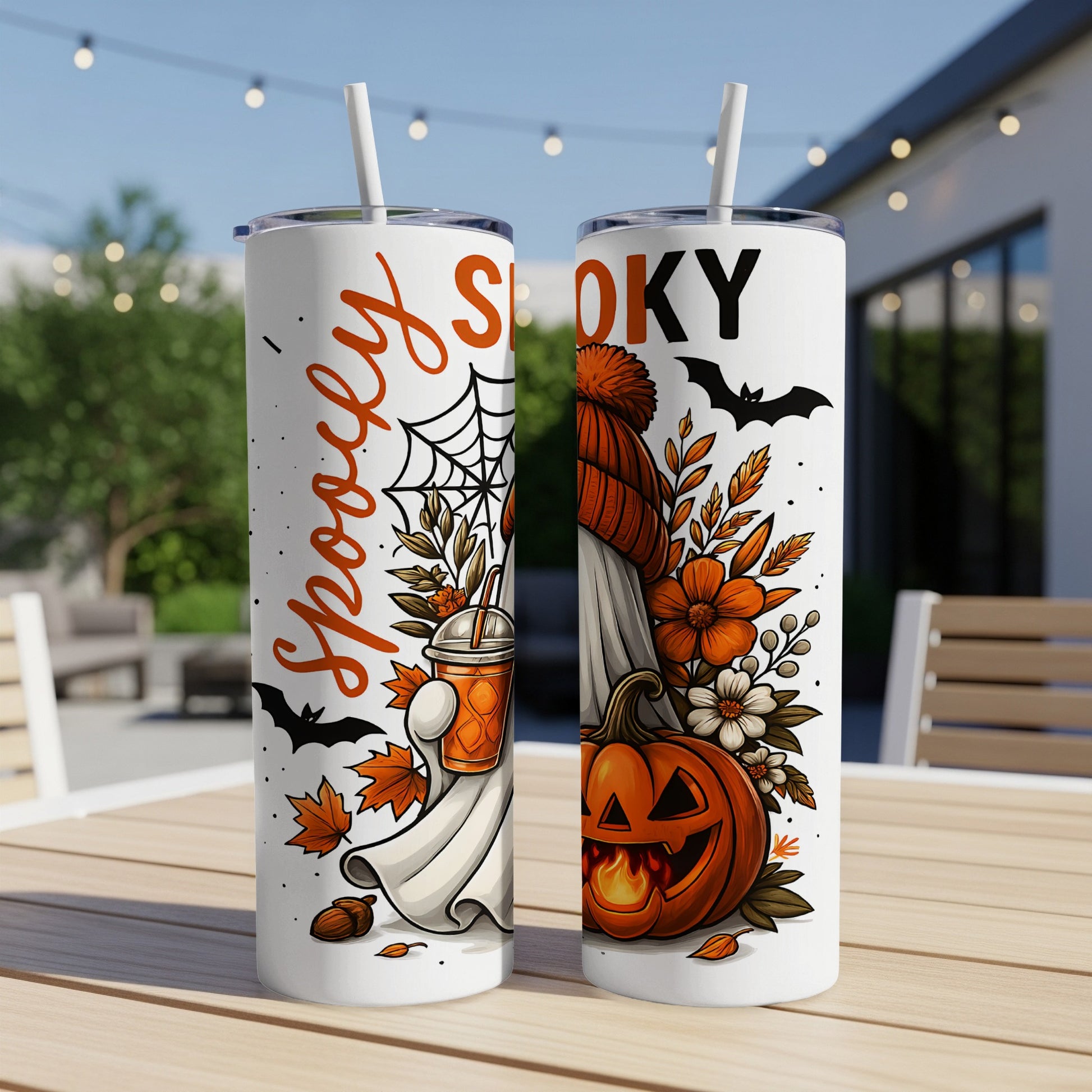 Two white tumblers with Halloween designs, featuring ghosts, pumpkins, and text.