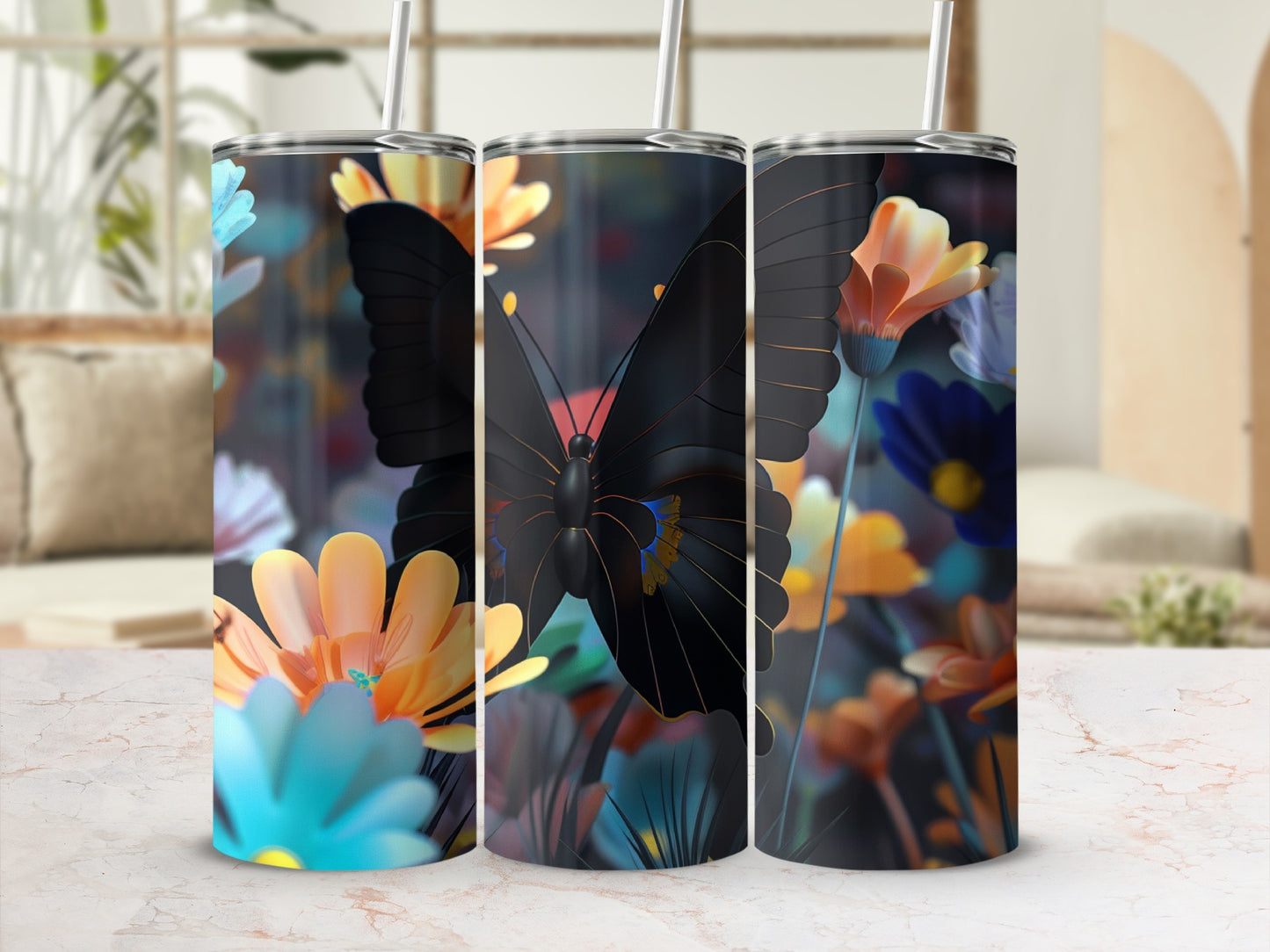 Three tumblers with black butterfly and floral designs on blurred background.