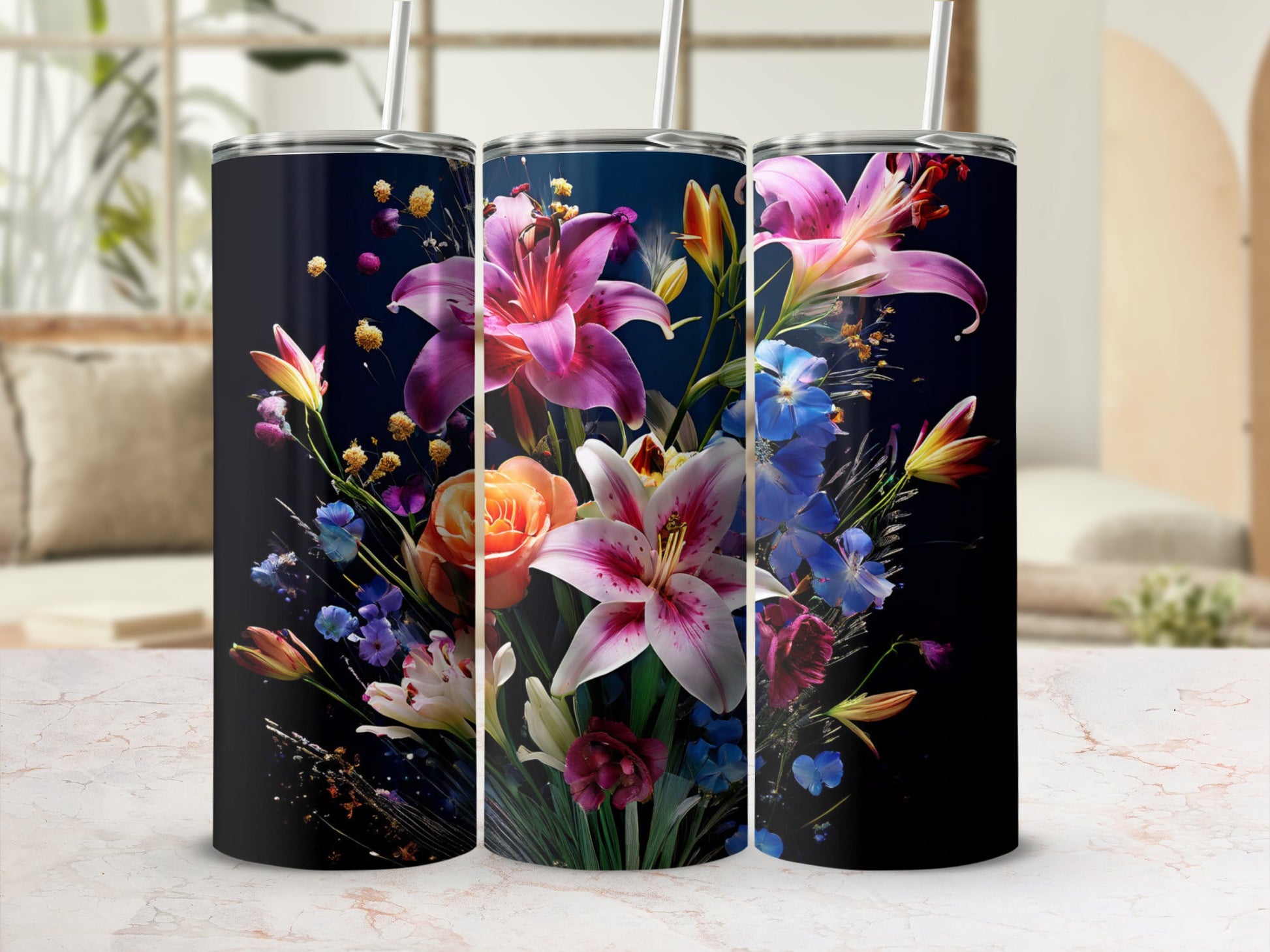 Floral tumbler with lilies and roses on a marble surface.