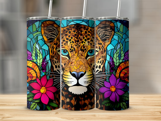 Leopard face with floral and stained glass accents on a white tumbler.