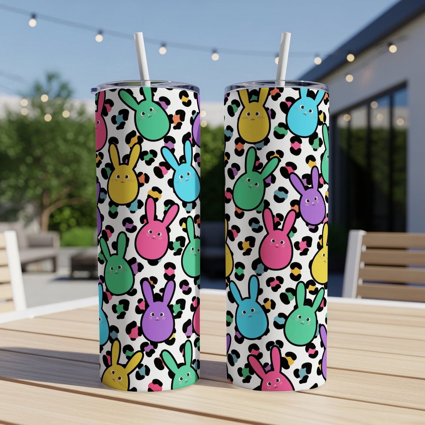 Two tumblers with a colorful bunny and leopard print design.