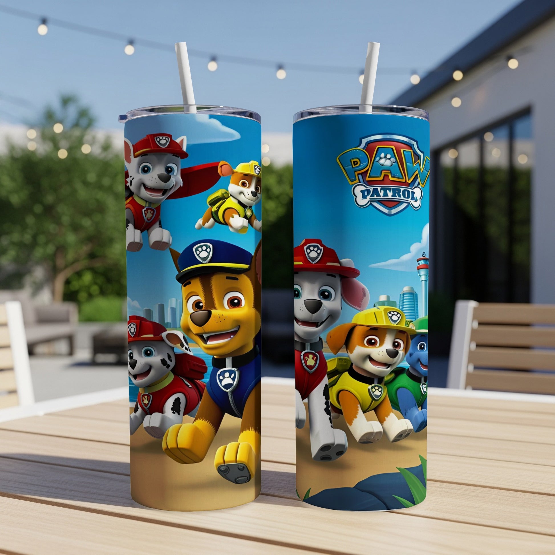 Paw Patrol characters on a blue tumbler with a white straw.