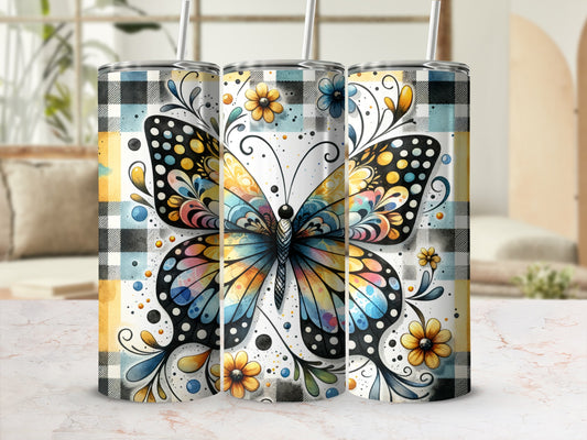 Tapered tumbler with colorful butterfly and plaid pattern.