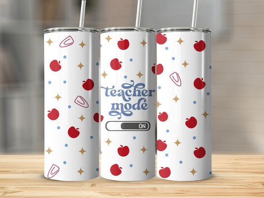Teacher mode on tumbler with apples and paper clips pattern.