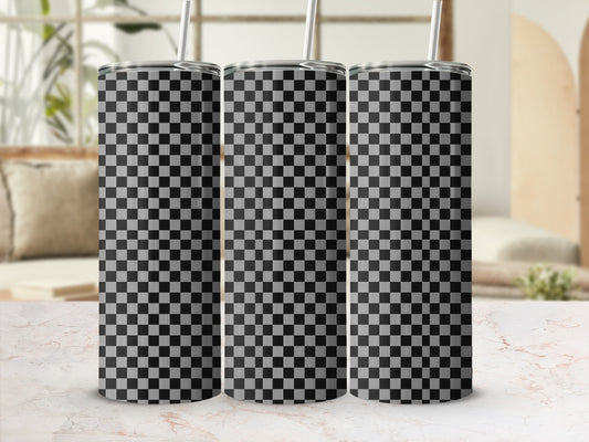 Three tumblers with a black and white checkered pattern, displayed on a marble surface.