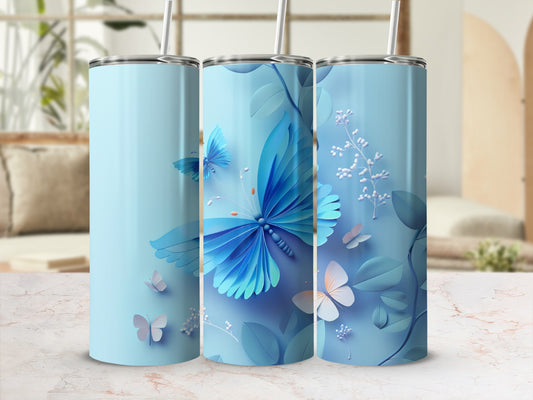 Three light blue tumblers with blue and white butterflies and floral designs.