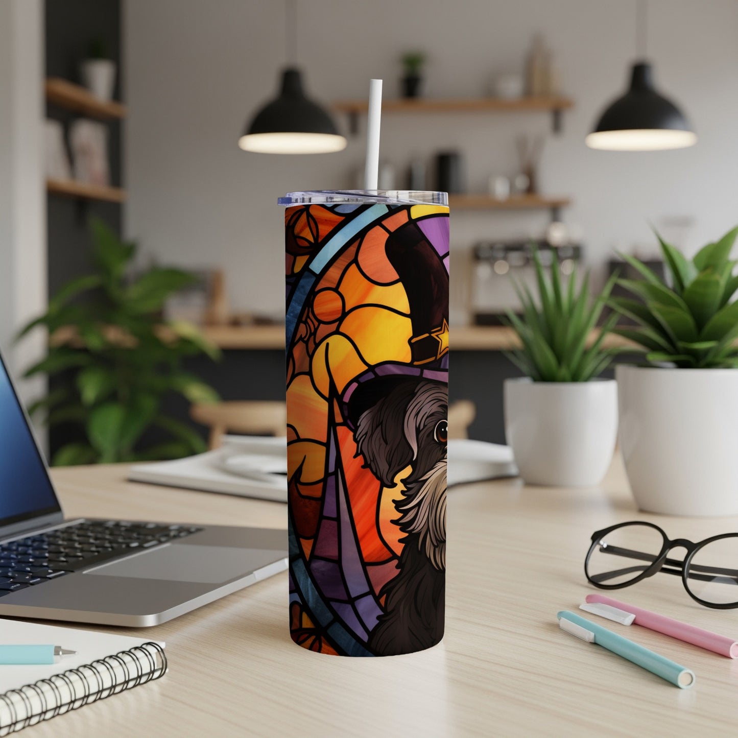 Stained glass tumbler with witch hat and dog design.