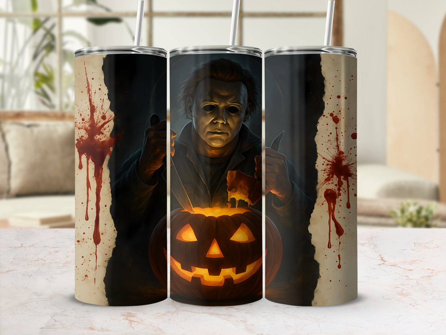 Michael Myers and carved pumpkin design on three tumblers with blood splatters.