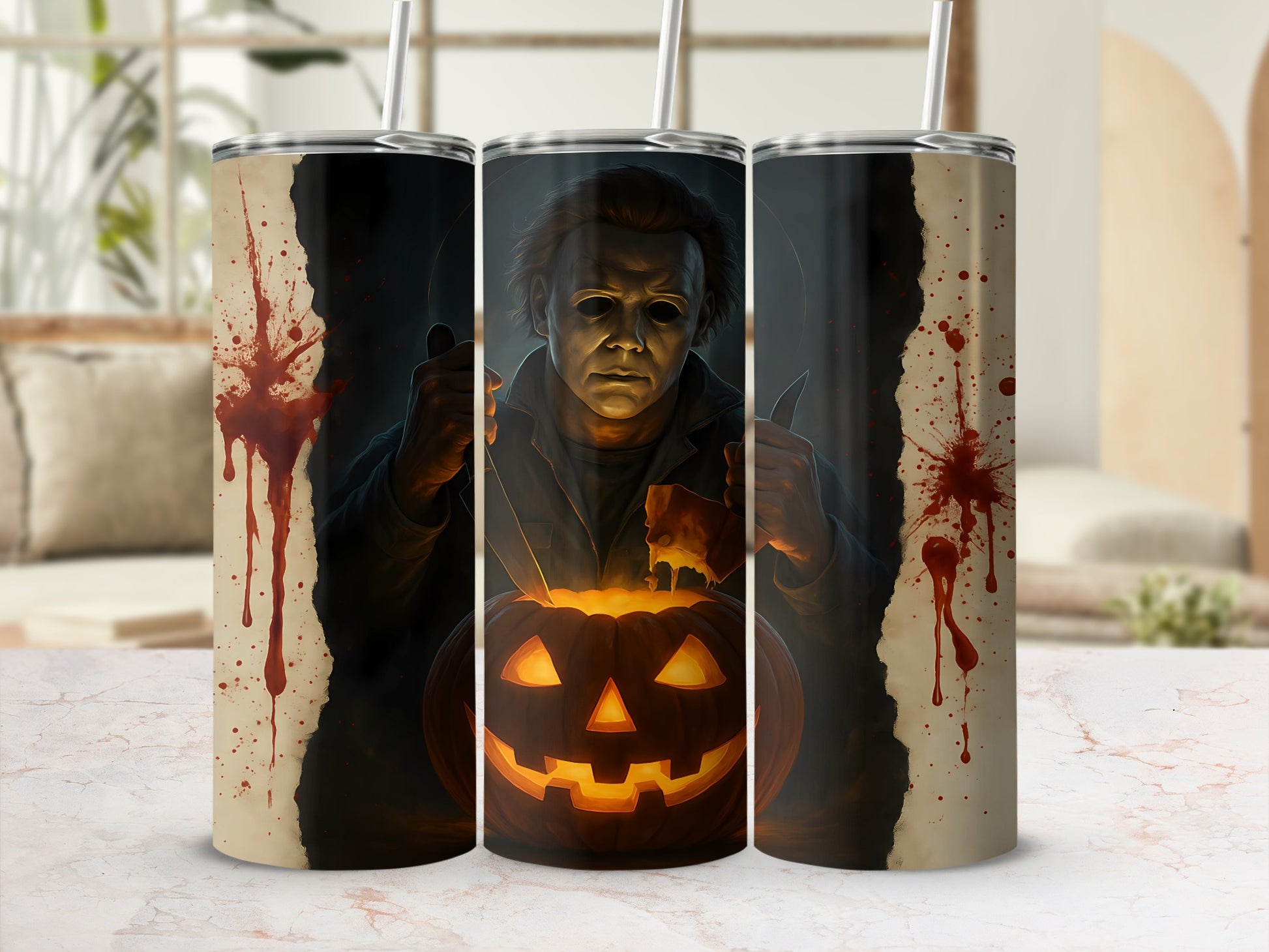 Michael Myers and carved pumpkin design on three tumblers with blood splatters.
