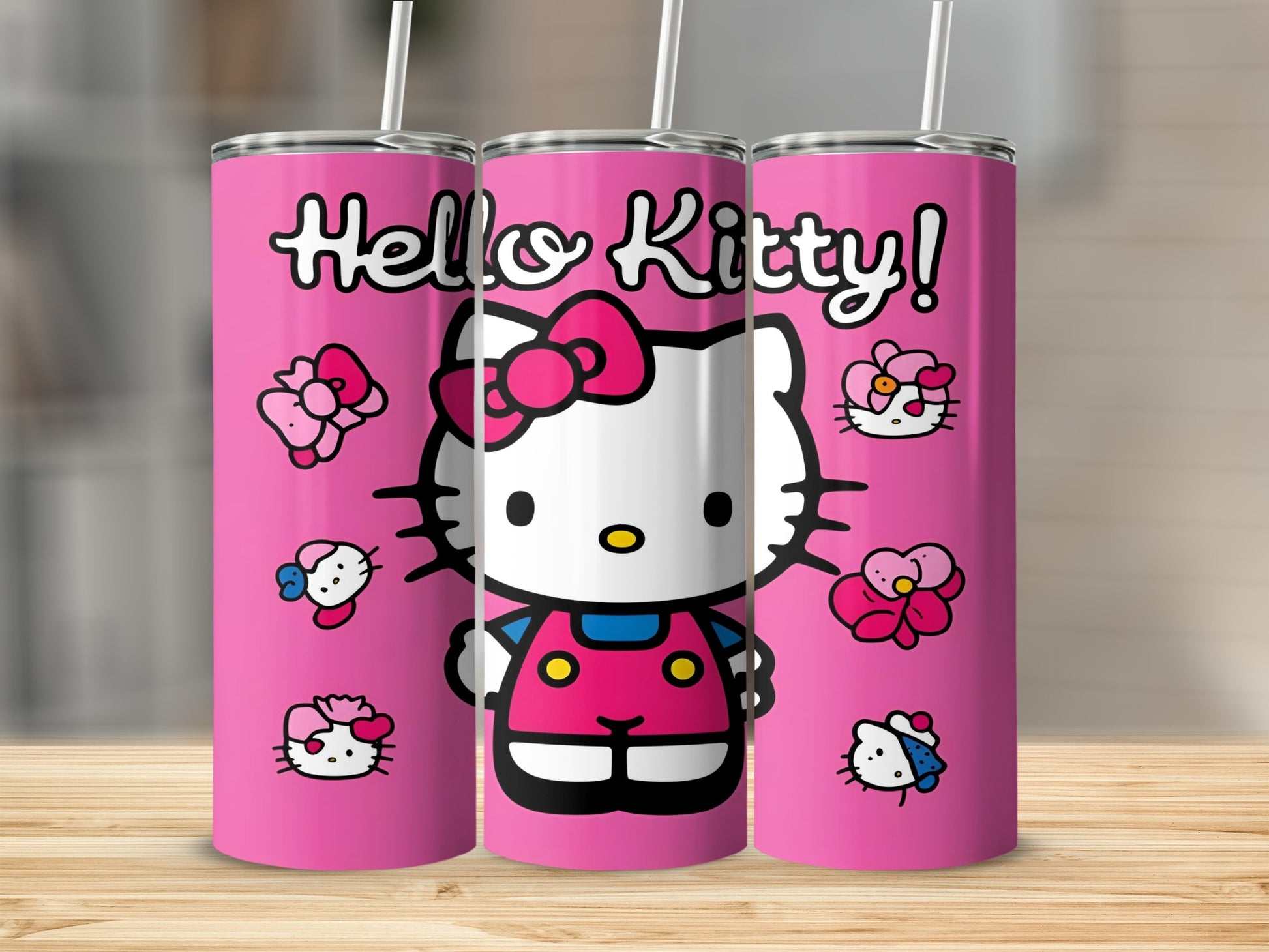 Pink tumbler with Hello Kitty character and bow.