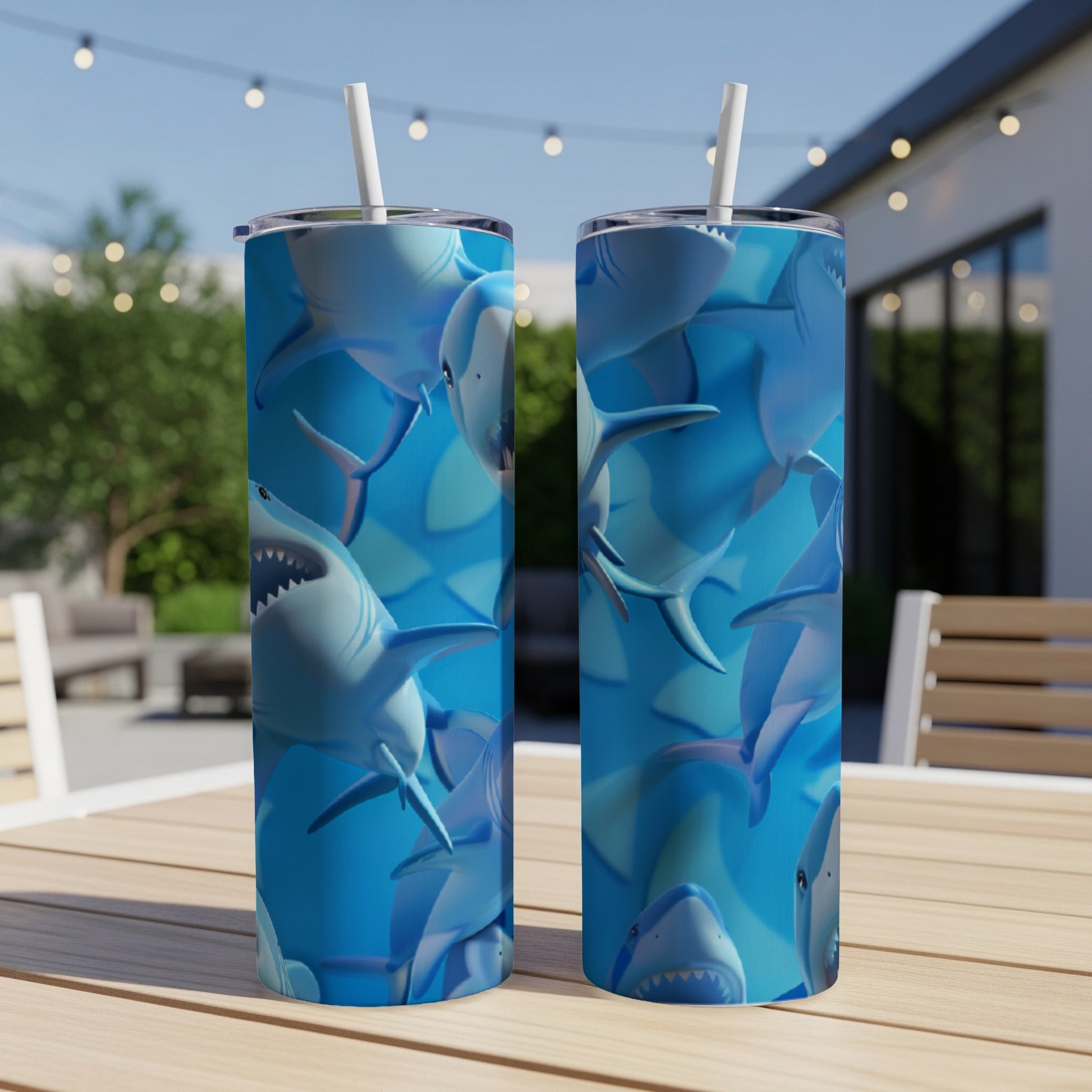 Blue tumbler with multiple cartoon sharks.