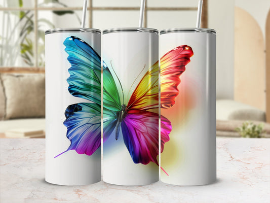 Three tumblers featuring a vibrant, multi-colored butterfly design.