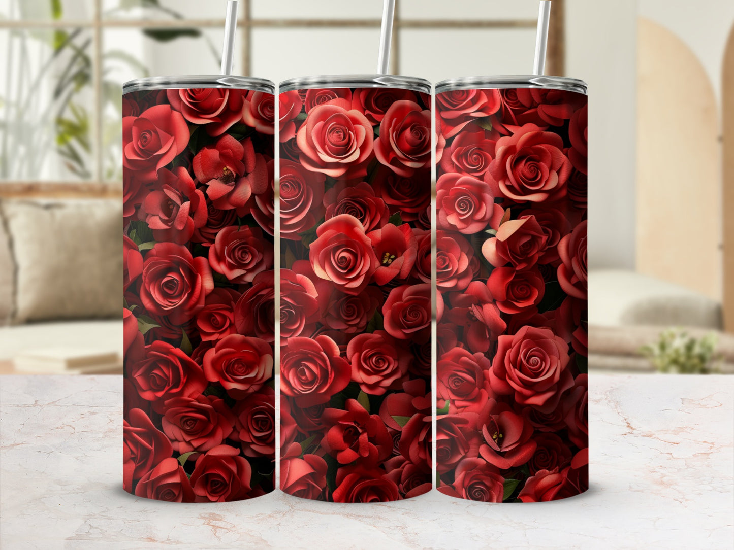 Three tumblers covered in a vibrant red rose floral pattern.