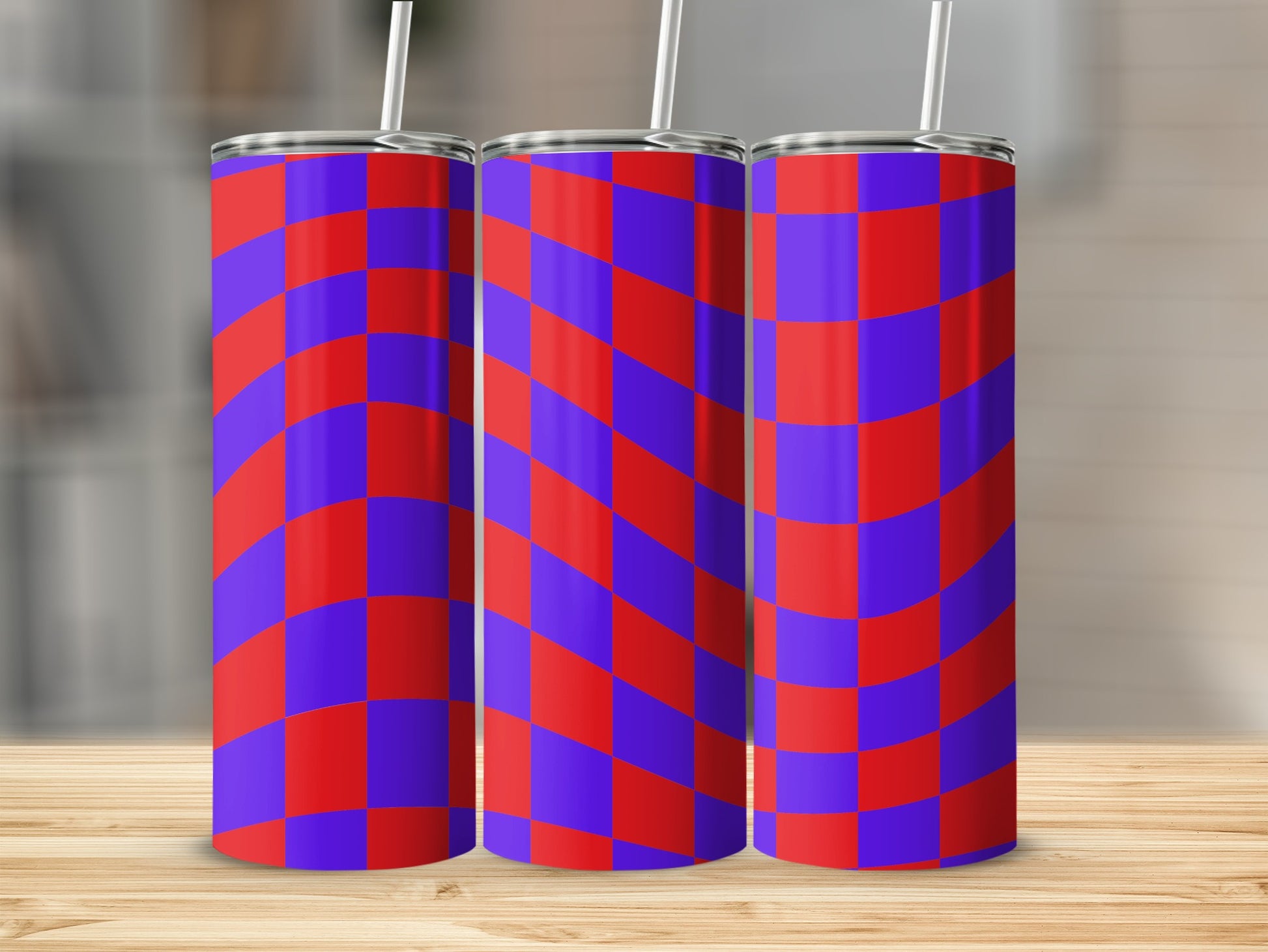 Three tall tumblers with a red and blue checkered warp pattern.