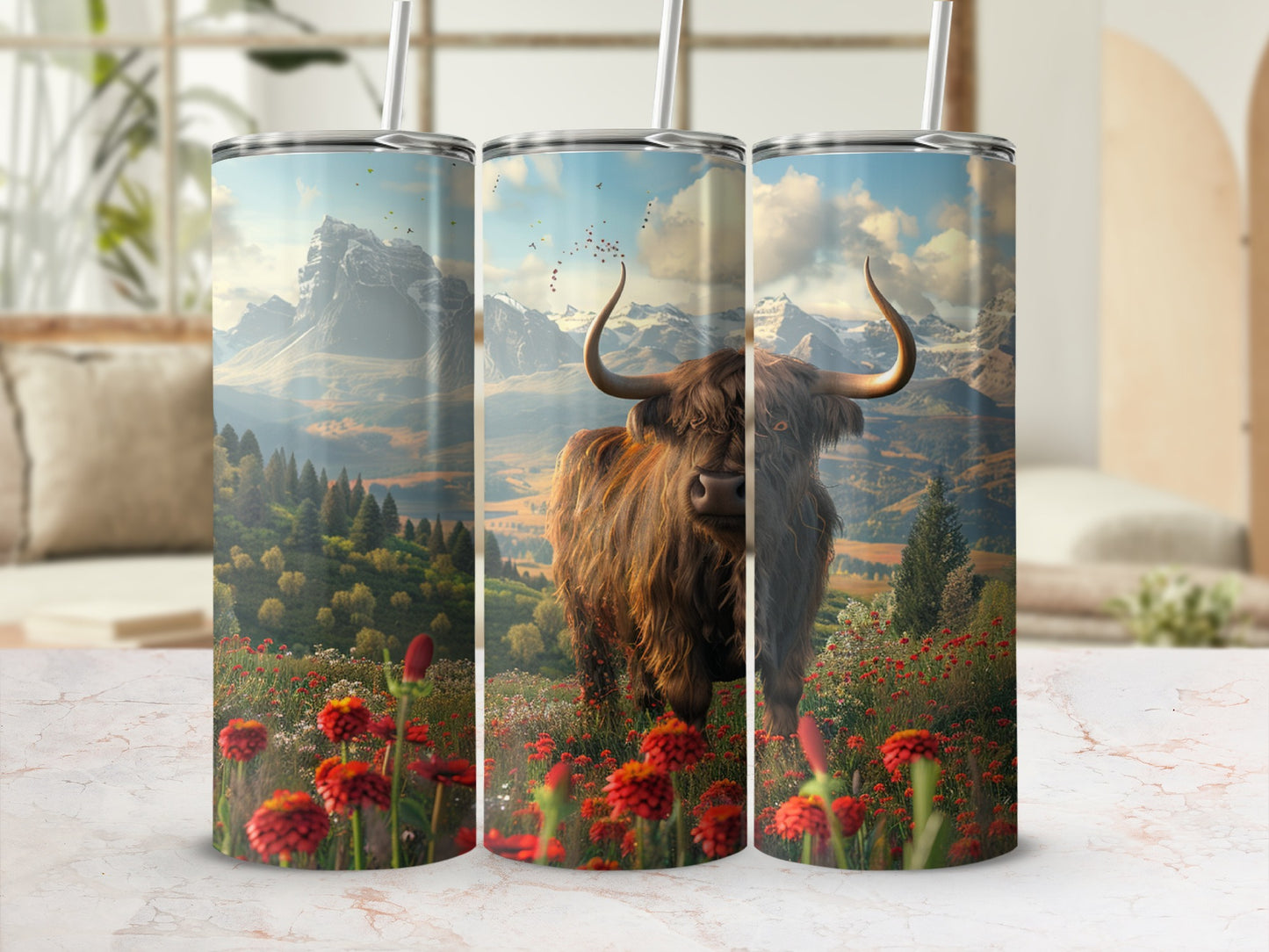 Highland cow in a field of red flowers with mountains in the background.