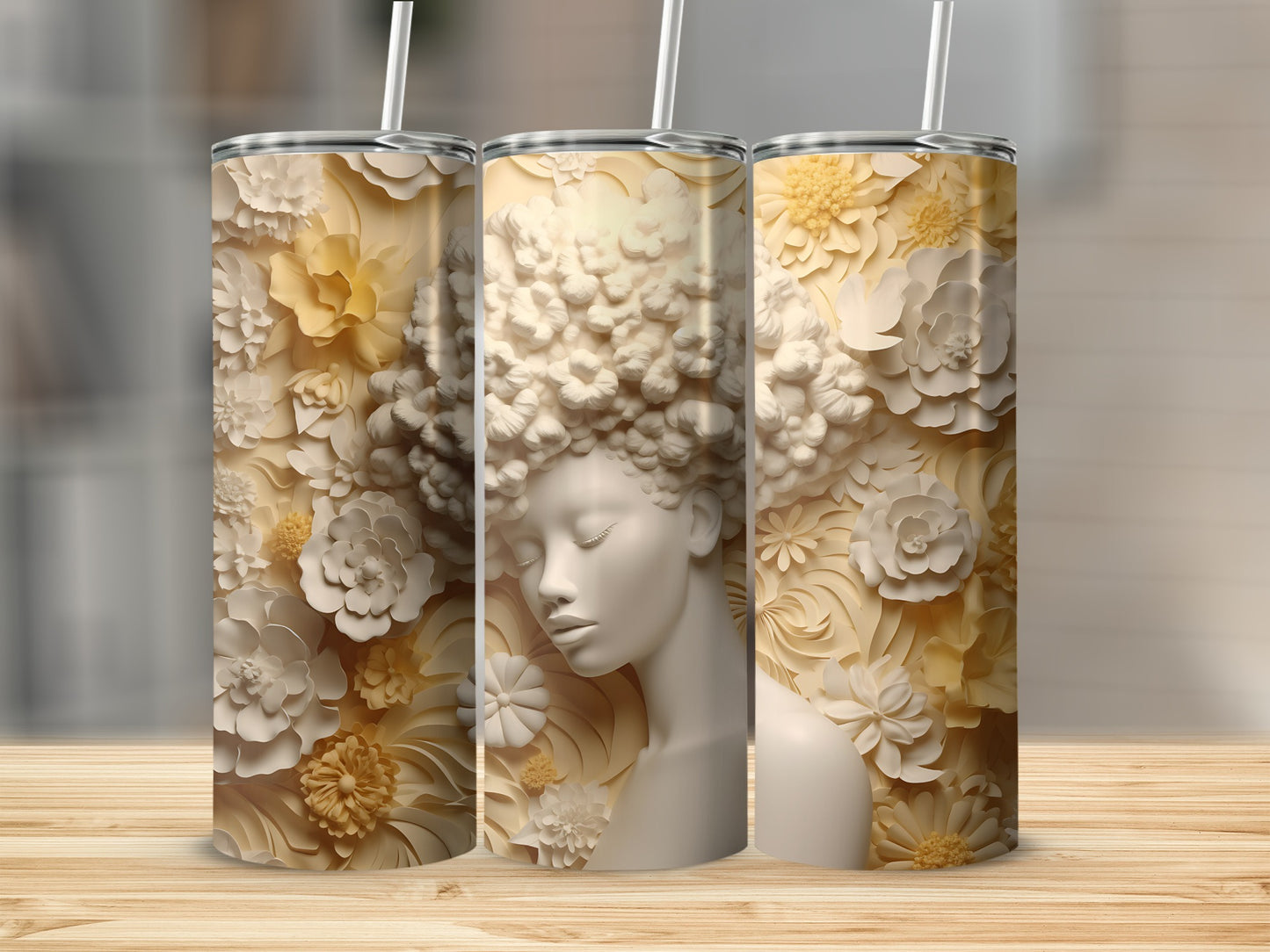 Triptych of tumblers with floral hair on a bust against a neutral background.