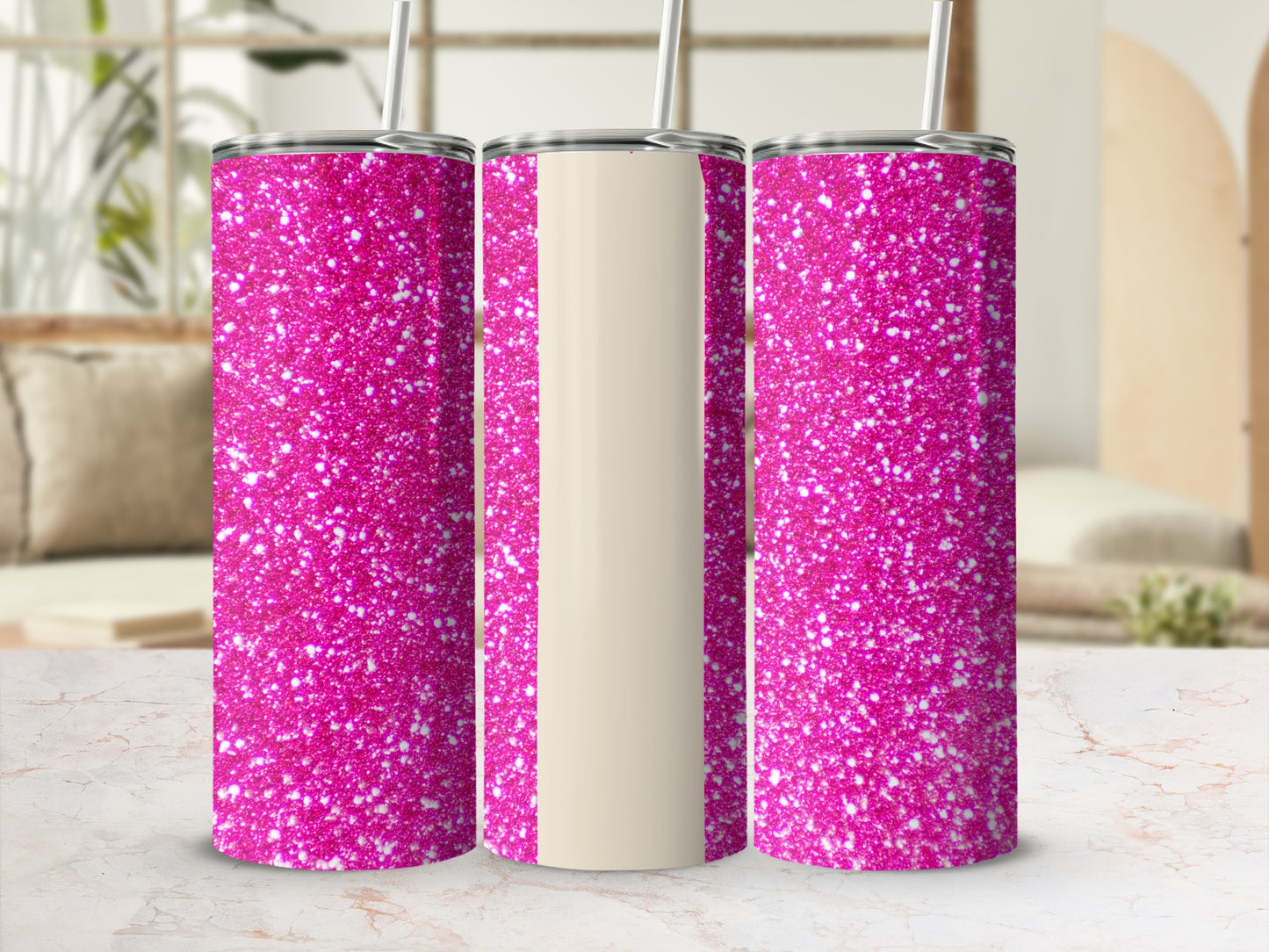 Three pink glitter tumblers with cream sections and straws.